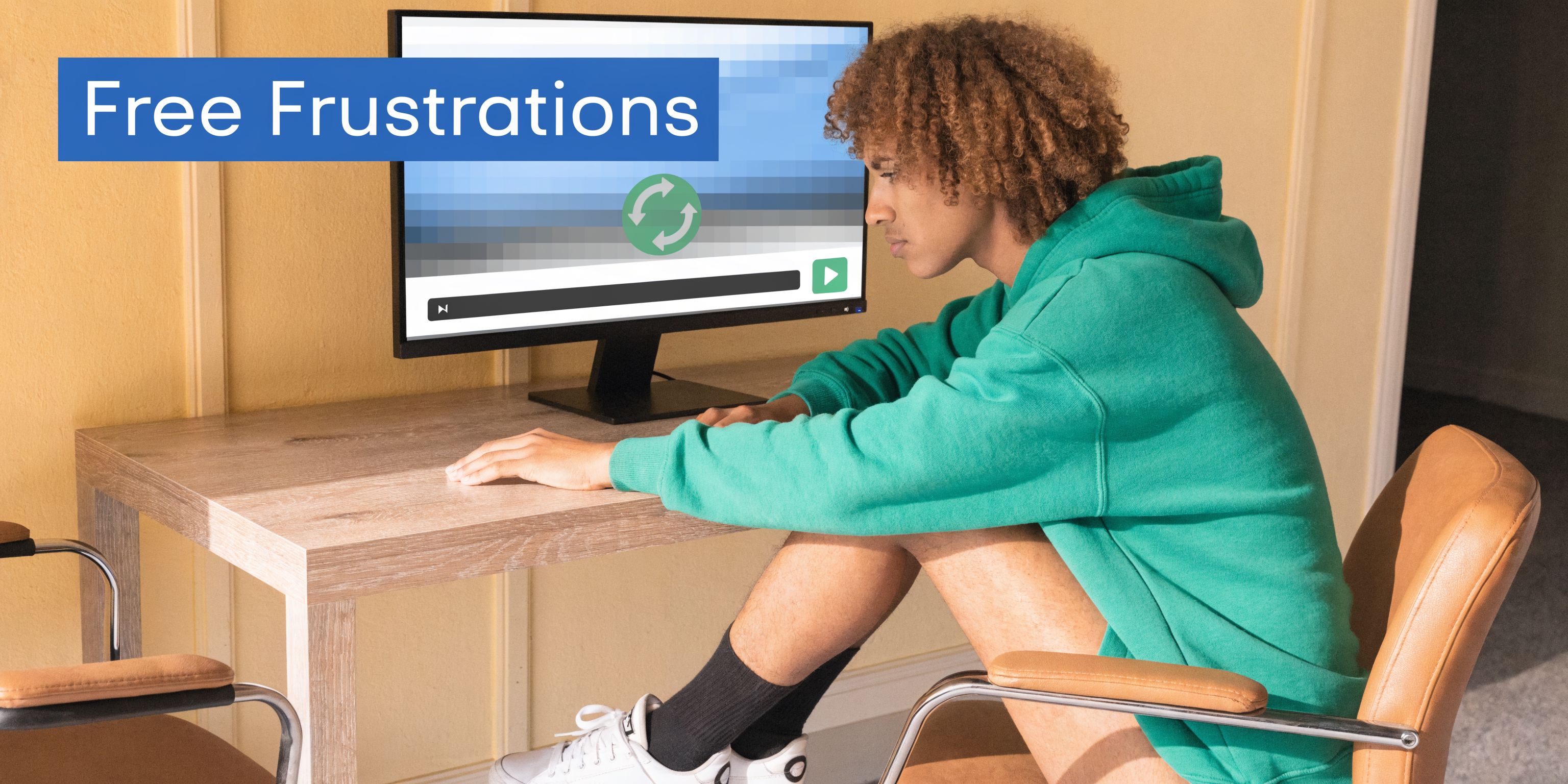 A young man wearing a green hoodie feeling frustrated while looking at a buffering computer screen.